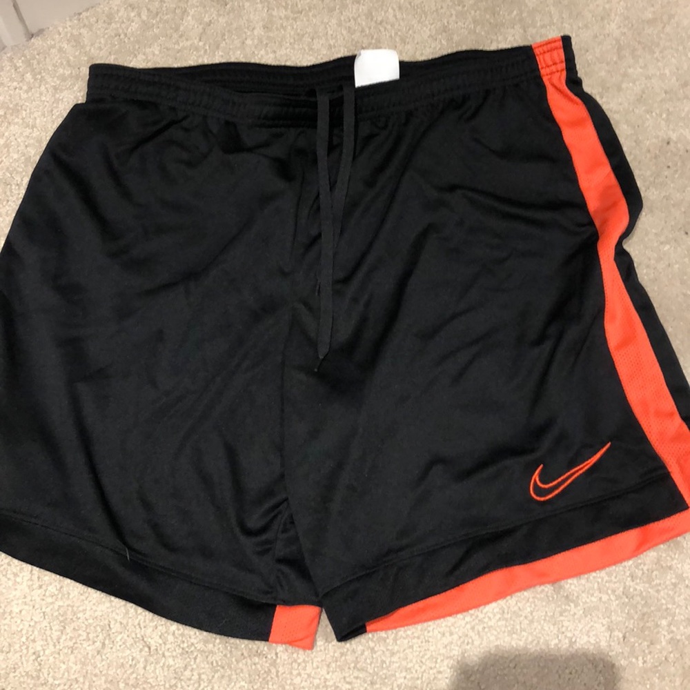 Nike black and pink basketball shorts
